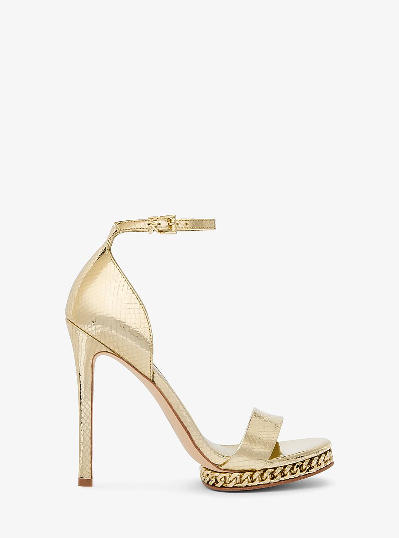 Sandalia Jordyn de piel metalizada con motivo de serpiente en relieve, plataforma y adornos in DORADO P&Aacute;LIDO | Michael Kors