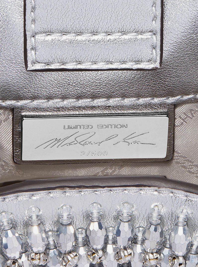 Borsa a spalla Rosie extra-small in similpelle metallizzata con decorazioni in edizione limitata