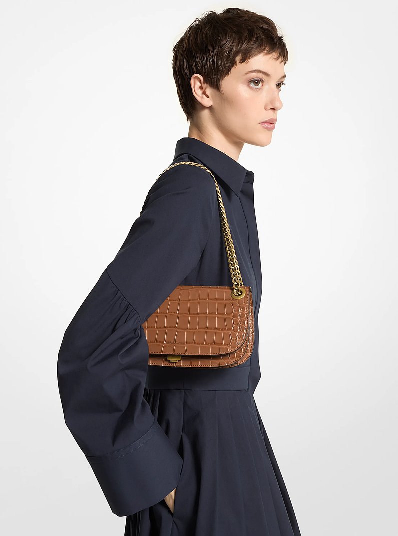 Christie Crocodile Embossed Leather Envelope Bag in SADDLE | Michael Kors