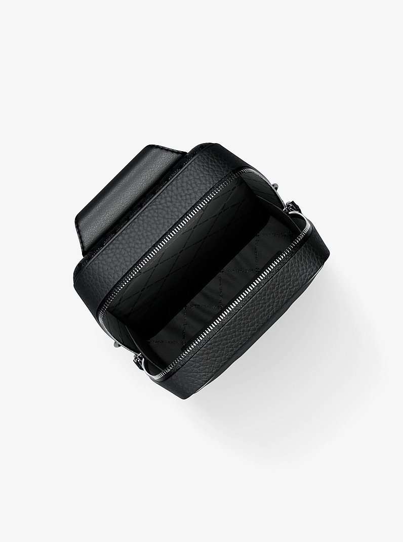 Cooper Medium Pebbled Leather Sling Pack in BLACK | Michael Kors