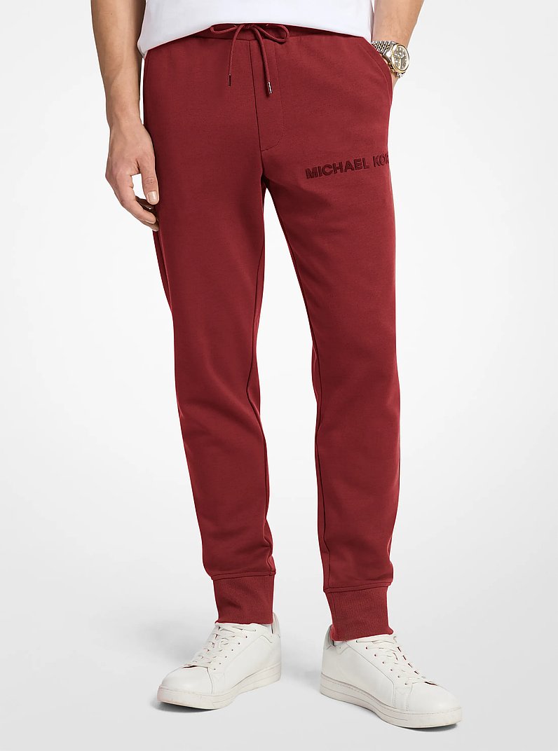 Embossed Logo Cotton Blend Joggers in CHERRY | Michael Kors