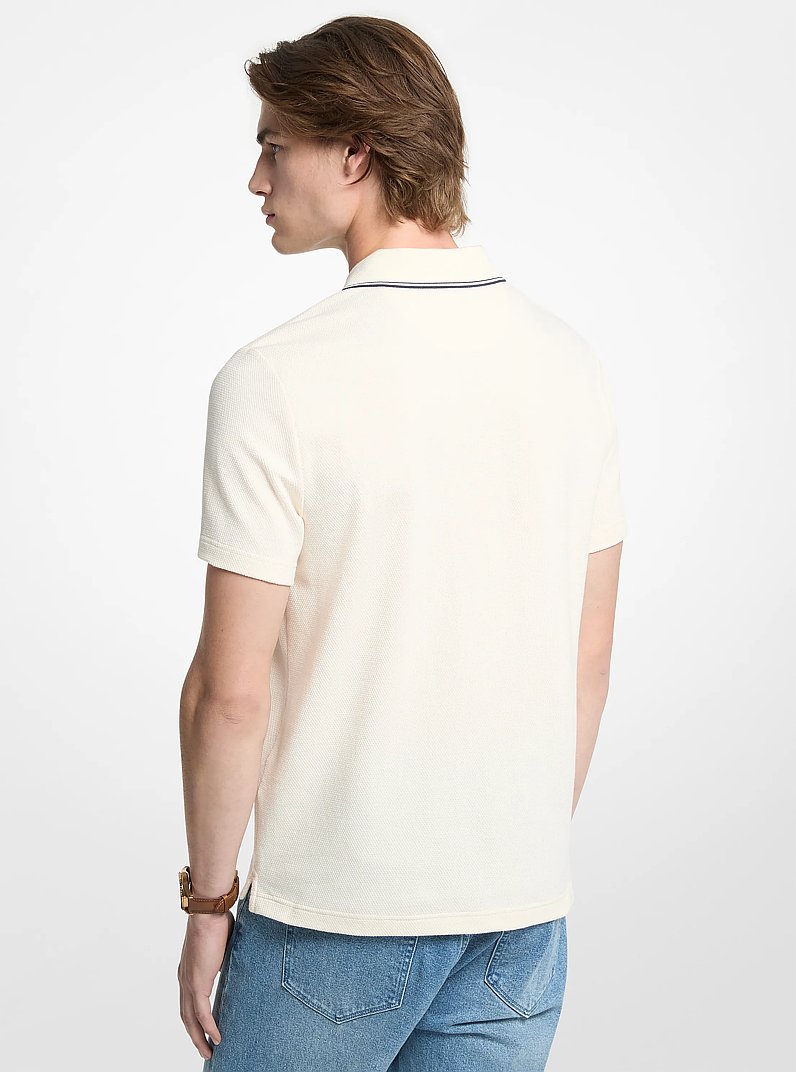 Polo de algod&oacute;n el&aacute;stico y texturizado con cremallera in HUESO | Michael Kors