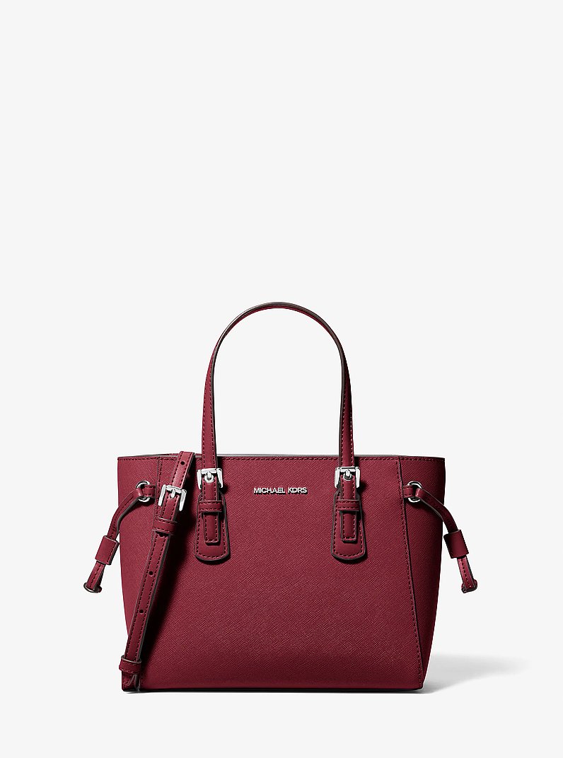 Bandolera Voyager convertible extrapeque&ntilde;a de piel granulada in GRANATE | Michael Kors