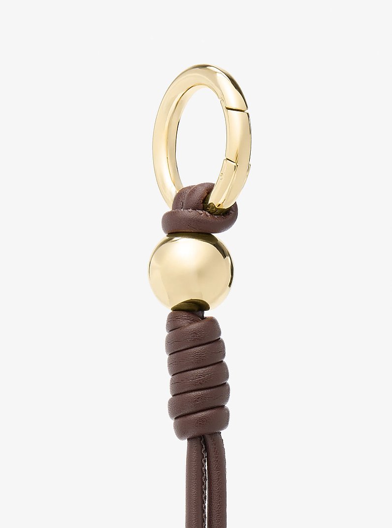 Breloque pour sac &agrave; n&oelig;ud de ton or in NOIX DE MUSCADE | Michael Kors