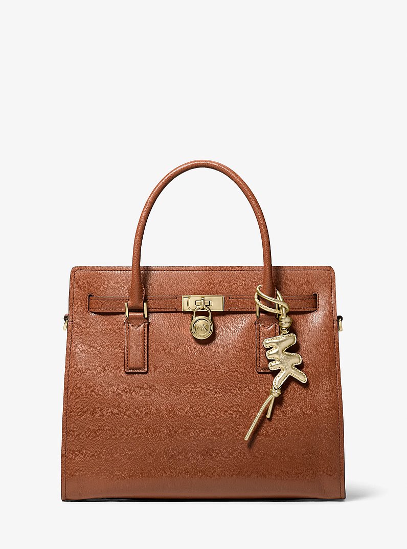 Metallic Puffy Logo Leather Bag Charm in PALE GOLD | Michael Kors