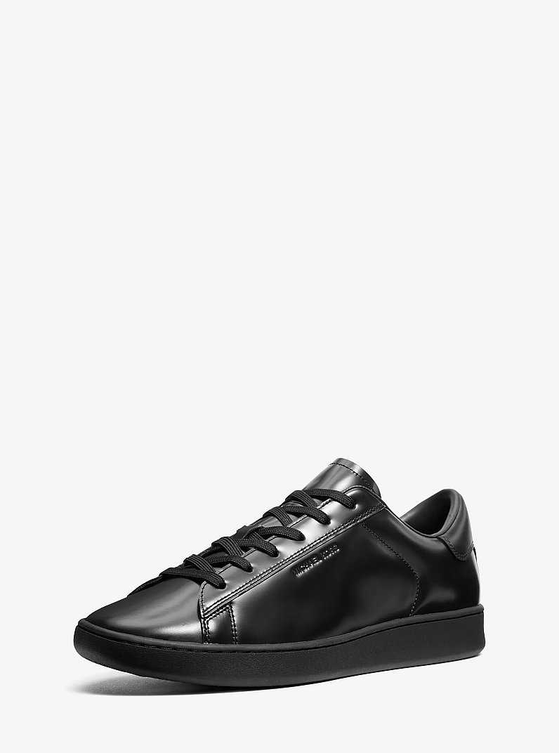 Reign Patent Leather Sneaker in BLACK | Michael Kors