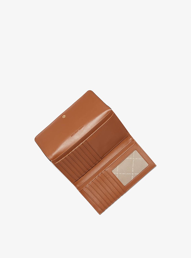 Billetera Jet Set grande de tres paneles con logotipo in VAINILLA | Michael Kors