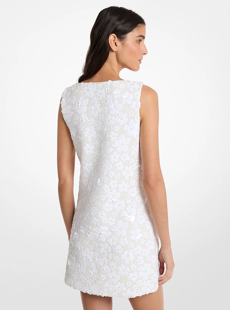 Mini-robe en n&eacute;opr&egrave;ne fleurie travaill&eacute;e in BLANC | Michael Kors