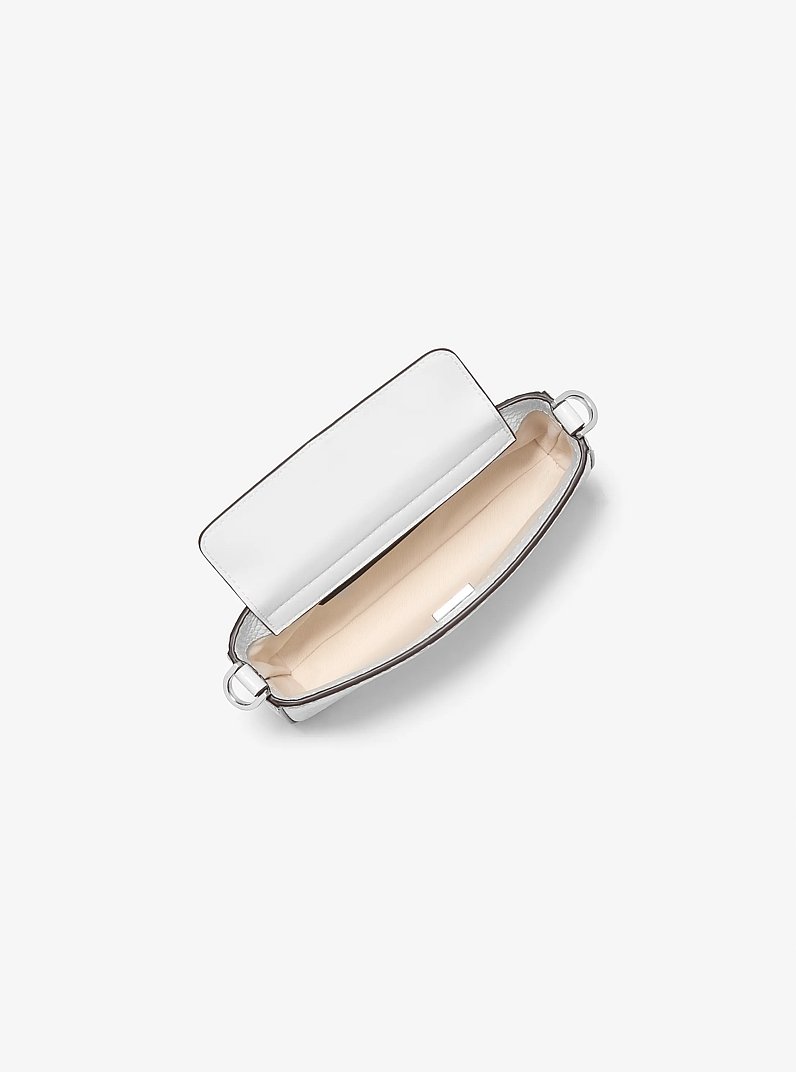 Petite pochette convertible Bryant en cuir gaufr&eacute; &agrave; motif de serpent in BLANC OPTIQUE | Michael Kors
