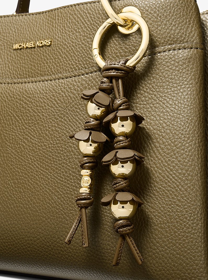 Taschenanh&auml;nger mit Zierblumen in LODEN | Michael Kors