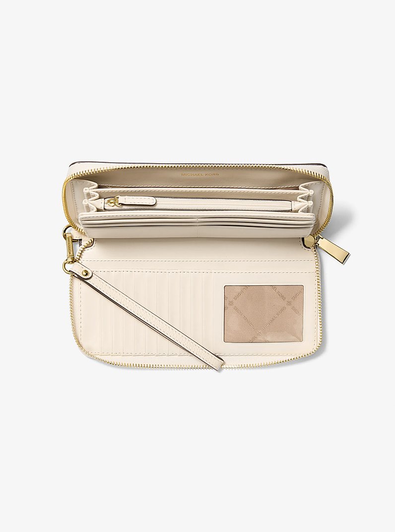Grand portefeuille continental Jet Set Travel en cuir grain&eacute; in CR&Egrave;ME CLAIRE | Michael Kors