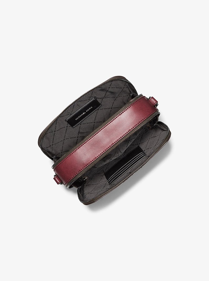 Hudson Logo Embossed Burnished Leather Crossbody Bag in OXBLOOD | Michael Kors