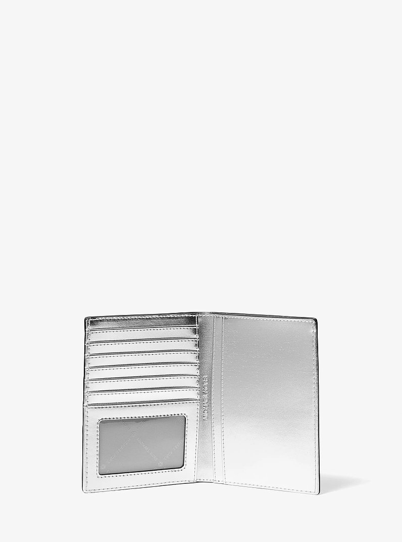 Funda para pasaporte Jet Set Travel mediana con adornos y logotipo de la marca in NEGRO | Michael Kors