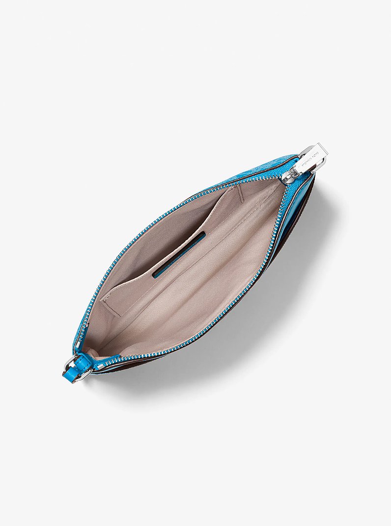 Pochette da polso convertibile Jet Set media con logo in BLU MILOS | Michael Kors