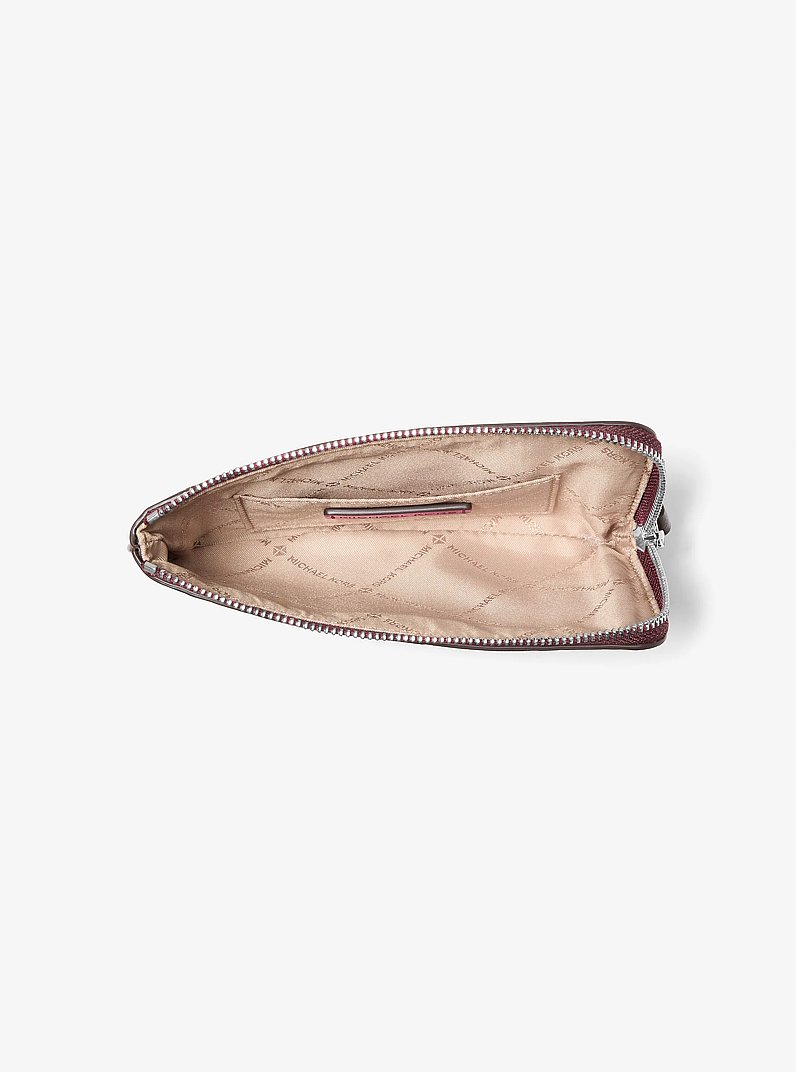 Jet Set Travel Small Burnished Logo Embossed Wristlet in MAROON | Michael Kors