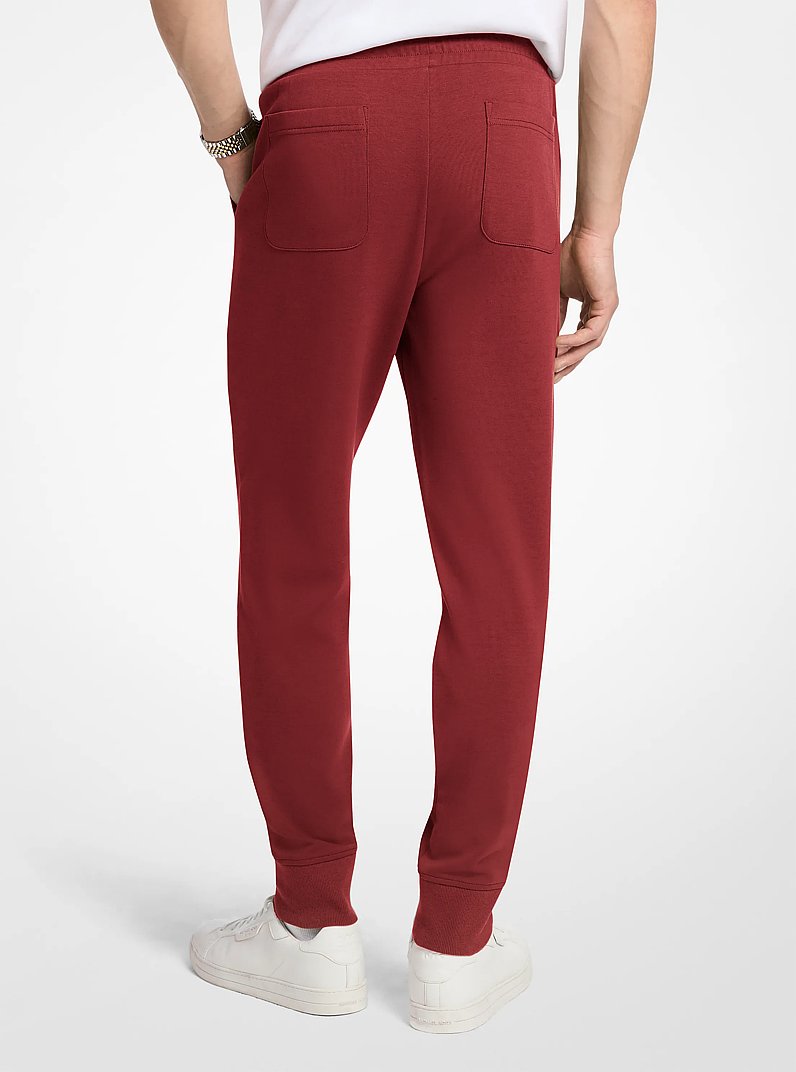Embossed Logo Cotton Blend Joggers in CHERRY | Michael Kors
