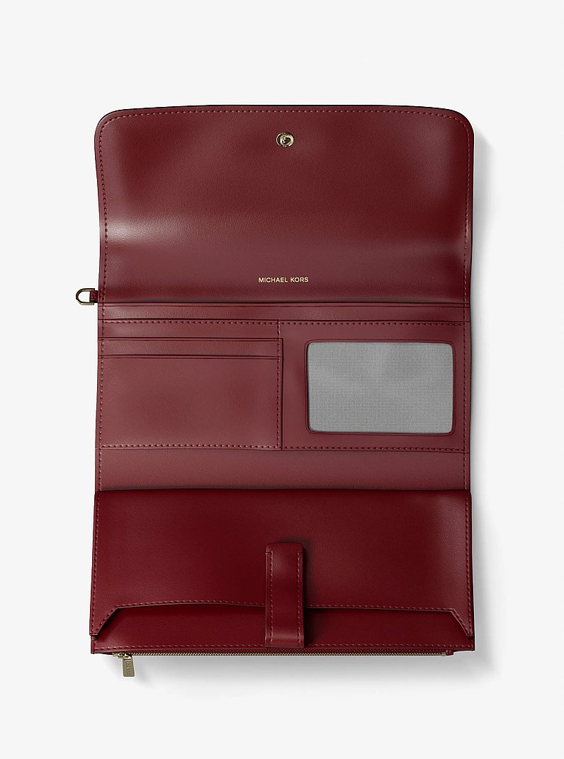 Jet Set Medium Pebbled Leather Smartphone Wristlet in DEEP RED | Michael Kors