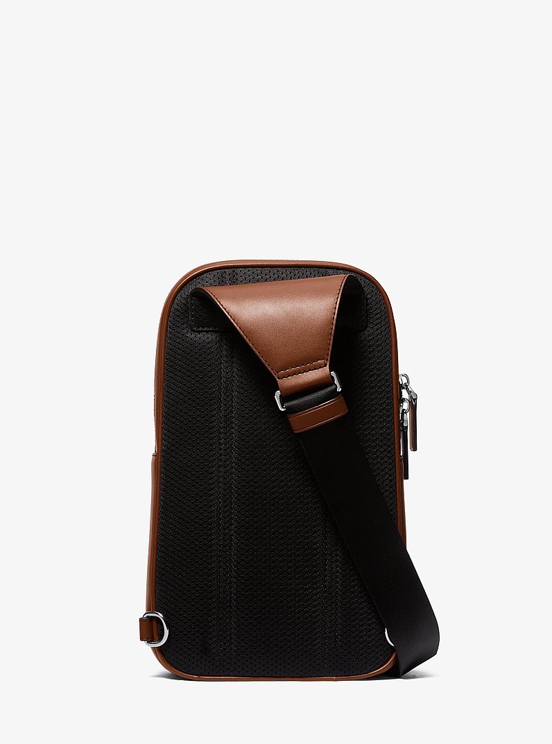 Cooper Slim Pebbled Leather Commuter Sling Pack in LUGGAGE | Michael Kors