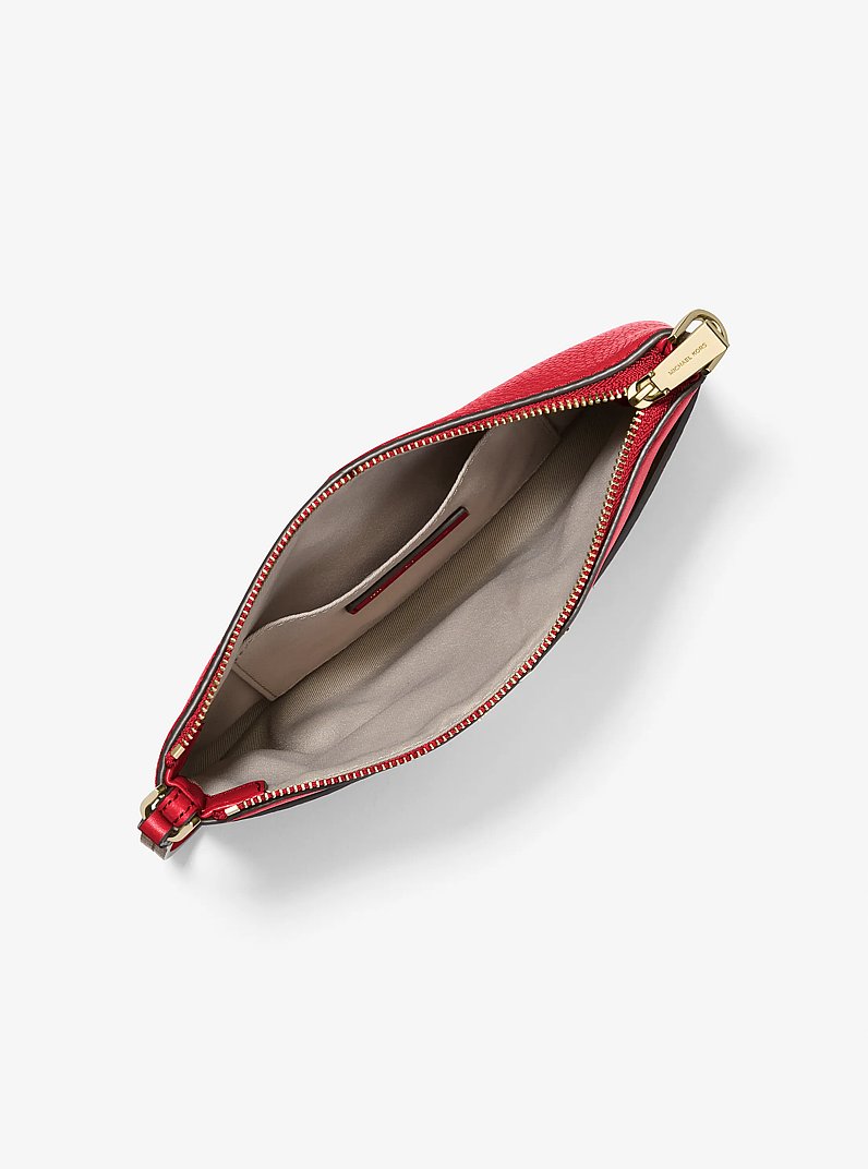 Pochette da polso Jet Set media in pelle martellata in CREMISI | Michael Kors