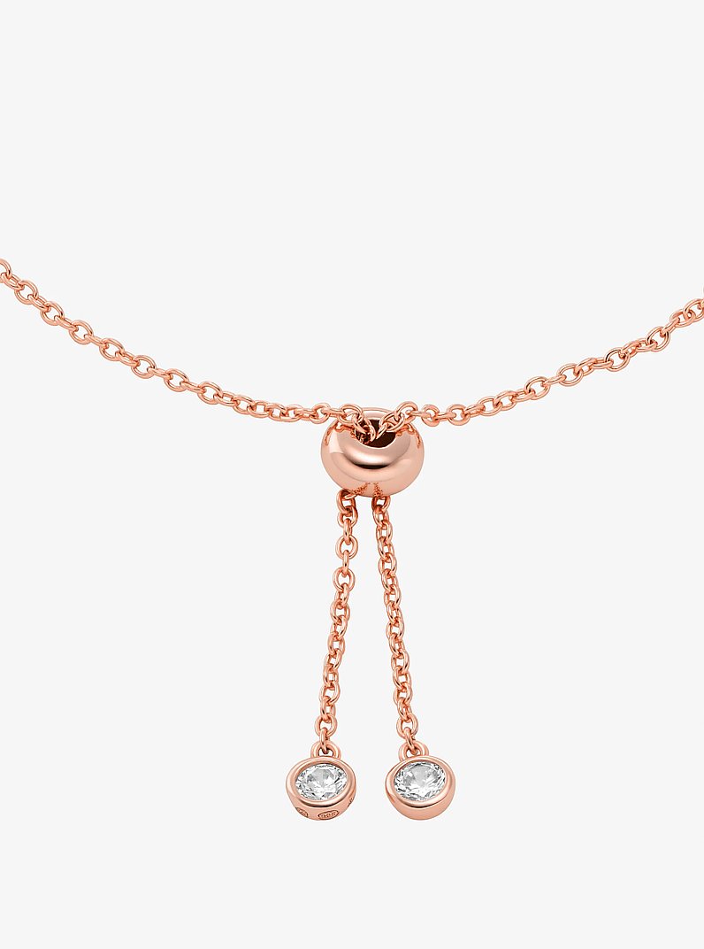 Armband Fulton mit Edelmetallbeschichtung, Schiebeknoten und Pav&eacute;-Logo in ROTGOLDTON | Michael Kors