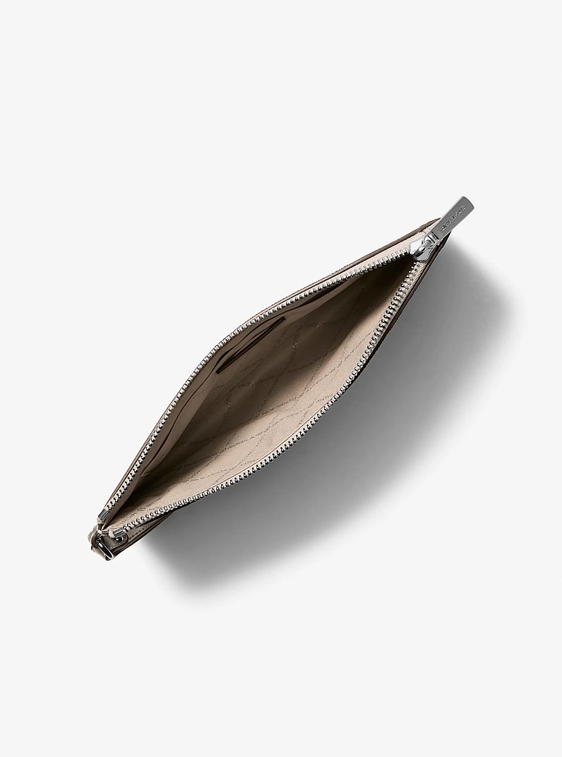 Jet Set Travel Large Studded Metallic Patchwork and Signature Logo Wristlet in SILVER | Michael Kors