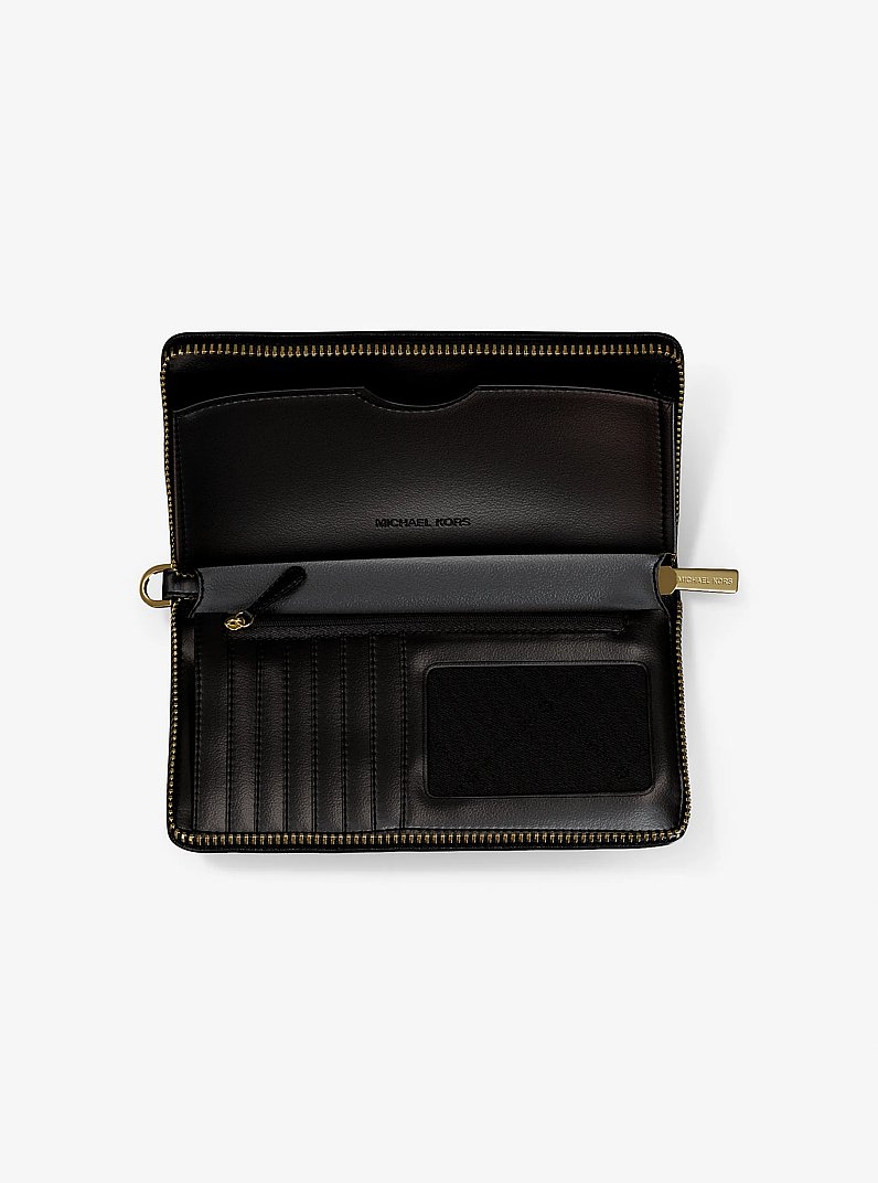Billetera Jet Set grande para tel&eacute;fono con logotipo exclusivo in NEGRO | Michael Kors