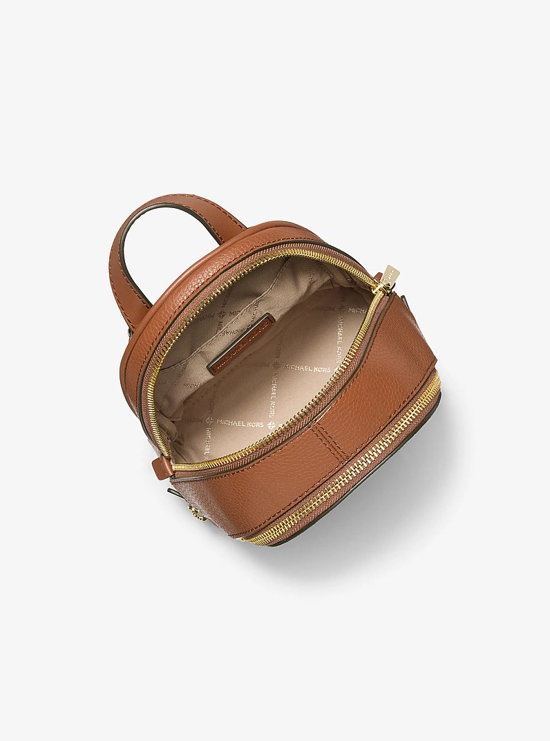 Rhea Extra-Small Pebbled Leather Backpack in LUGGAGE - Sale