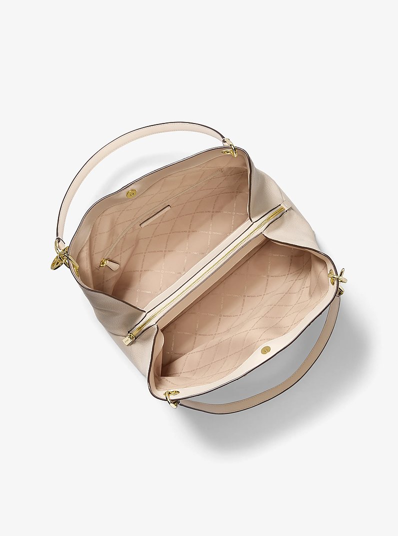Bolso de hombro Christina grande de piel granulada in CREMA CLARO | Michael Kors