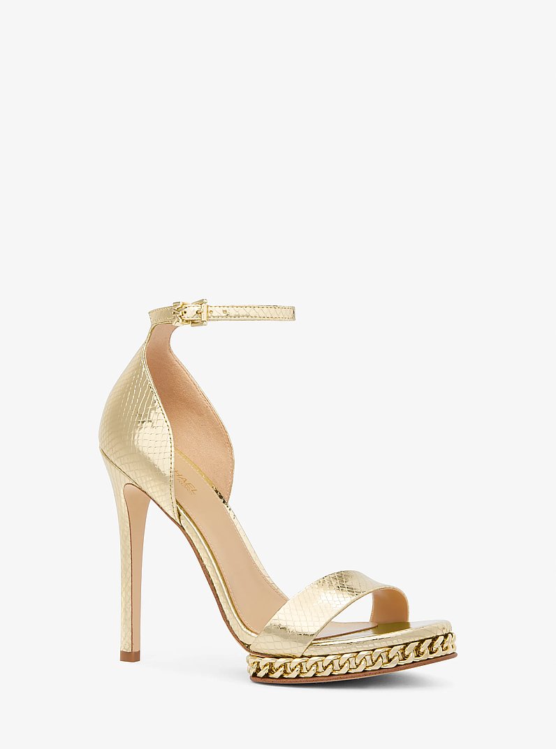 Sandalia Jordyn de piel metalizada con motivo de serpiente en relieve, plataforma y adornos in DORADO P&Aacute;LIDO | Michael Kors