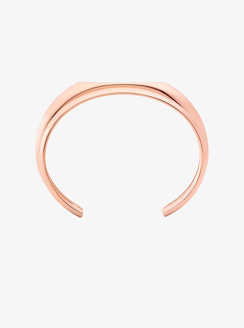 Manchettes avec logo grav&eacute; in OR ROSE | Michael Kors
