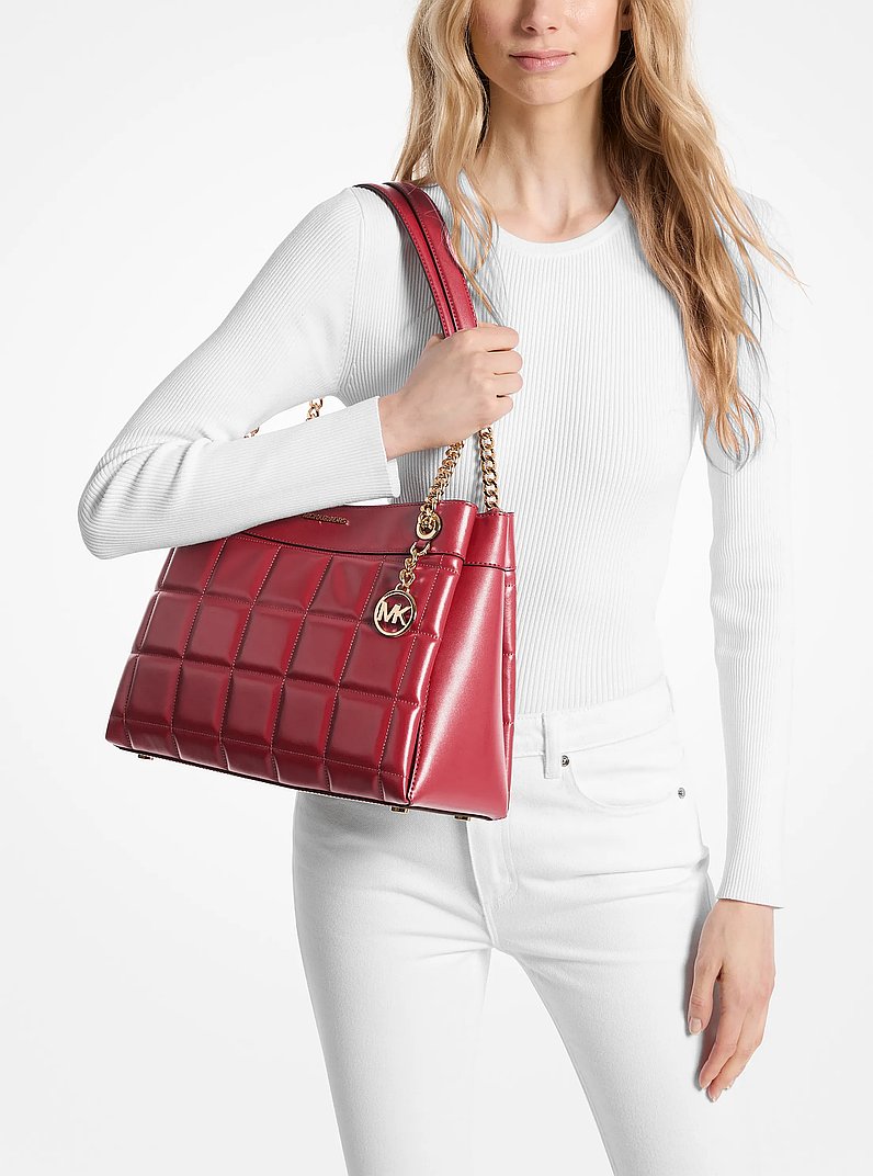 Sac fourre-tout Susan de taille moyenne en cuir matelass&eacute; in ROUGE PROFOND | Michael Kors
