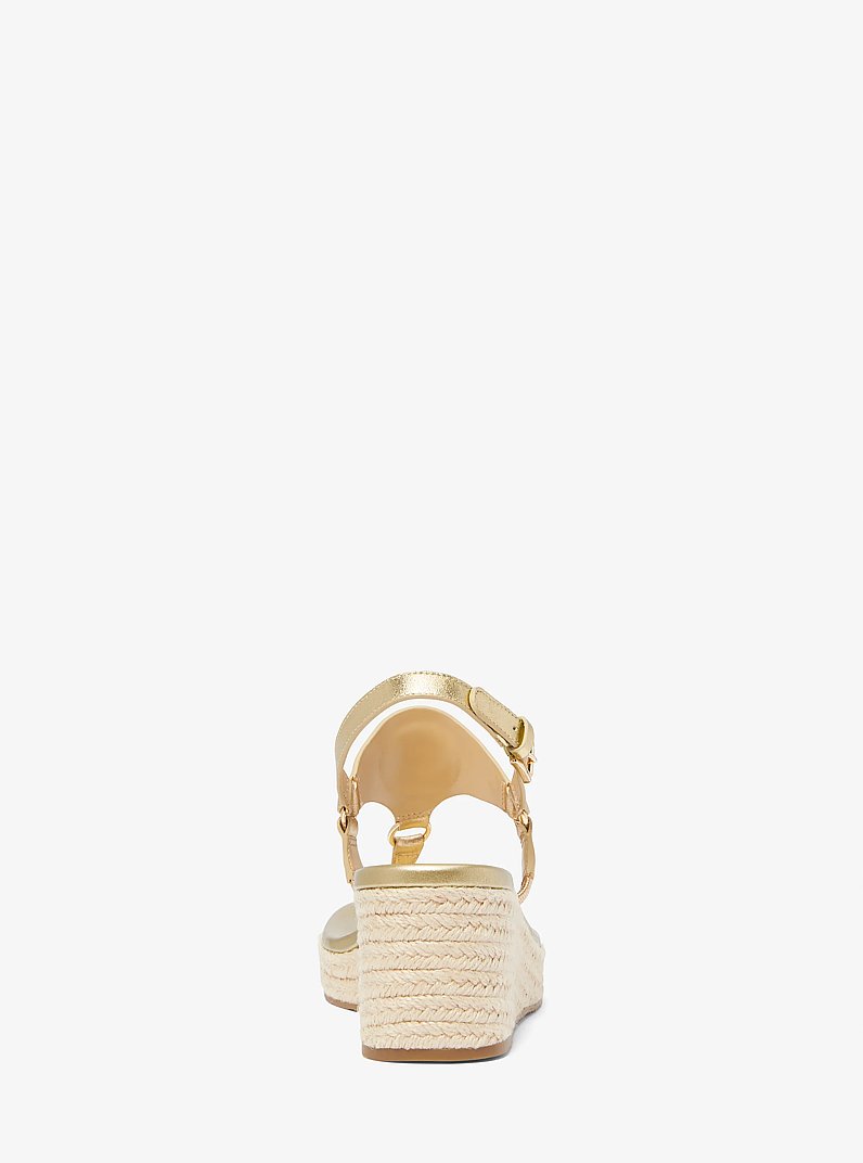 Sandalo con zeppa Casey in pelle metallizzata
