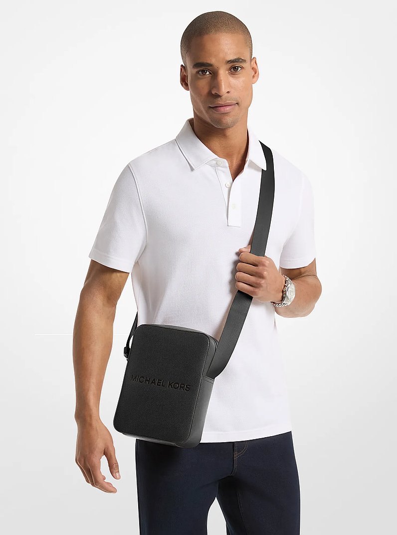 Cooper Logo Embossed Pebbled Leather Messenger Bag in BLACK | Michael Kors