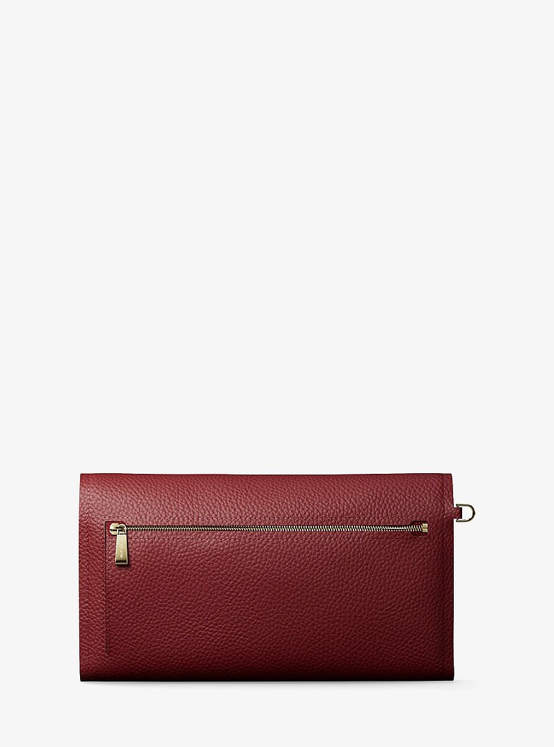 Jet Set Medium Pebbled Leather Smartphone Wristlet in DEEP RED | Michael Kors
