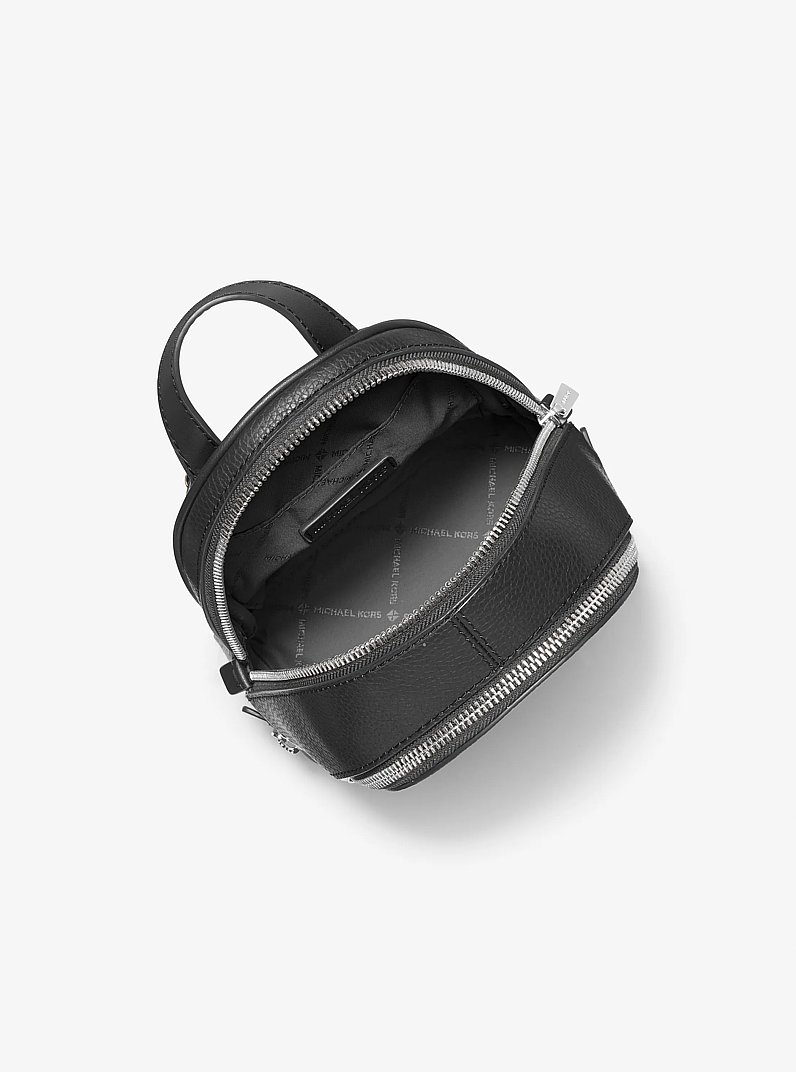 Rhea Extra-Small Pebbled Leather Backpack in NEGRO | Michael Kors