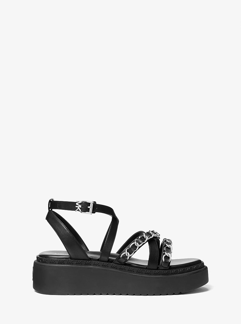 Sandalia Issi de piel con adornos y plataforma plana in NEGRO | Michael Kors