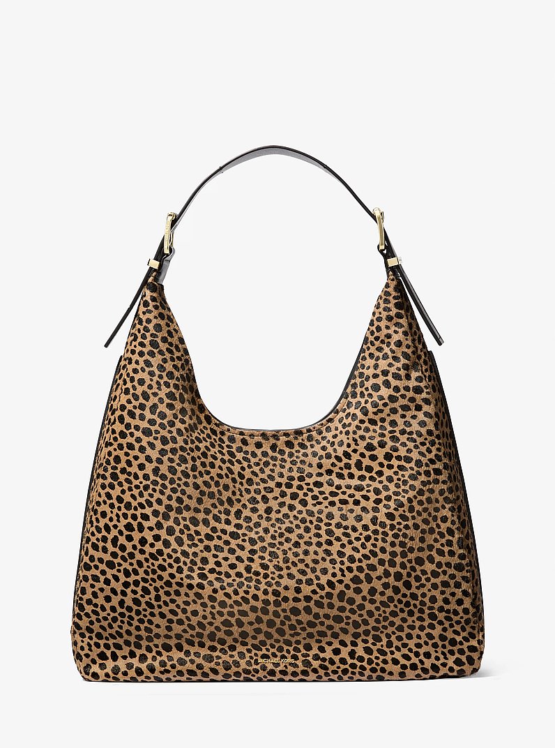 Grand sac &agrave; &eacute;paule boh&egrave;me Nolita en poils de veau &agrave; imprim&eacute; gu&eacute;pard in HUSK MULTI | Michael Kors