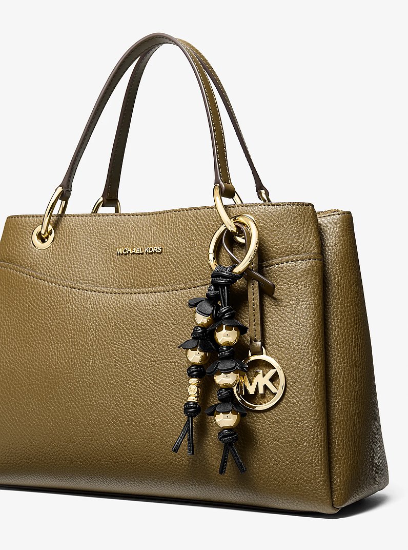 Breloque de sac florale travaill&eacute;e in NOIR | Michael Kors