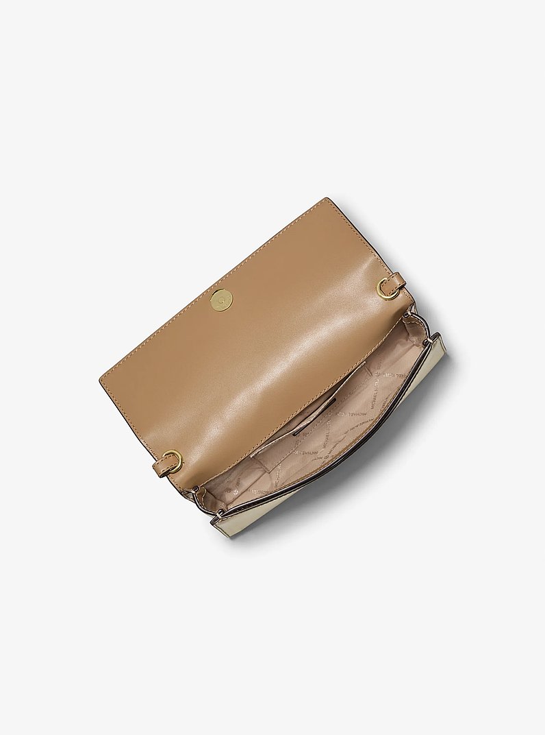 Jet Set Medium Metallic Leather Clutch in PALE GOLD | Michael Kors