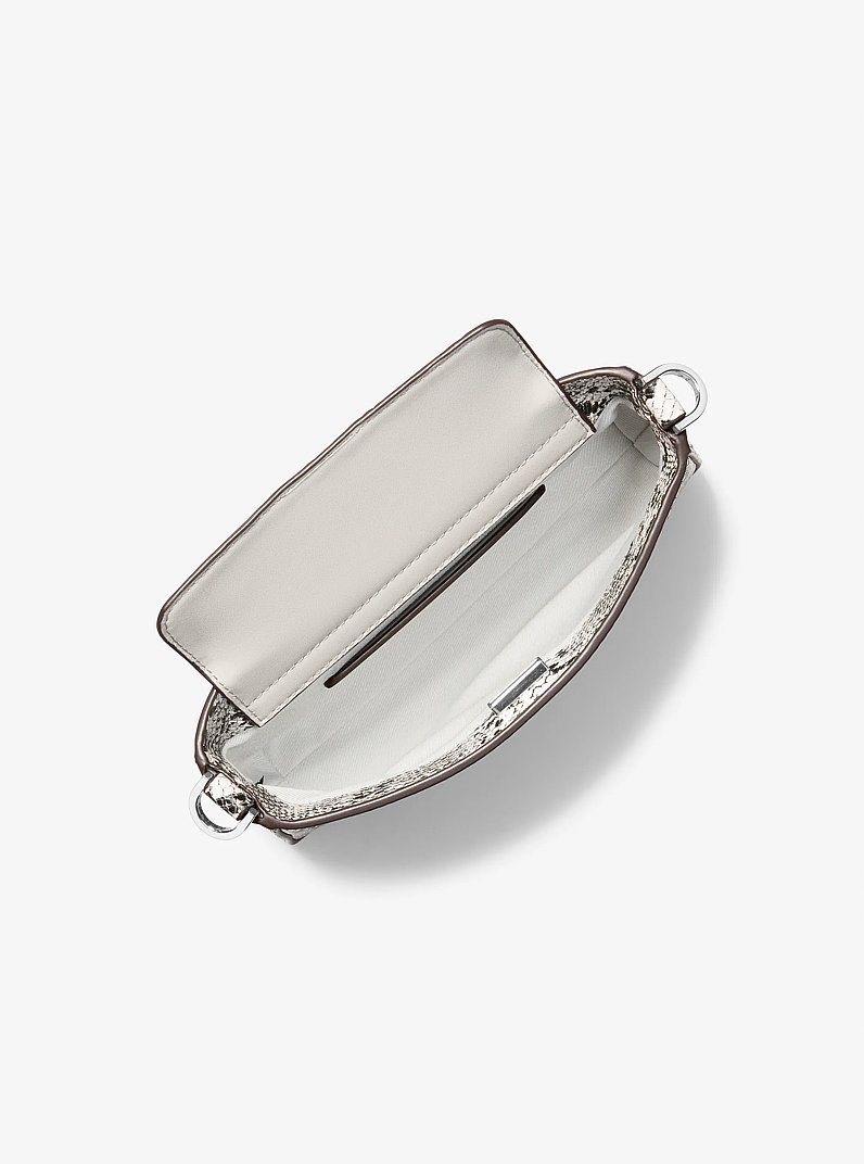 Petite pochette convertible Bryant en cuir gaufr&eacute; &agrave; motif de serpent in ALUMINIUM | Michael Kors