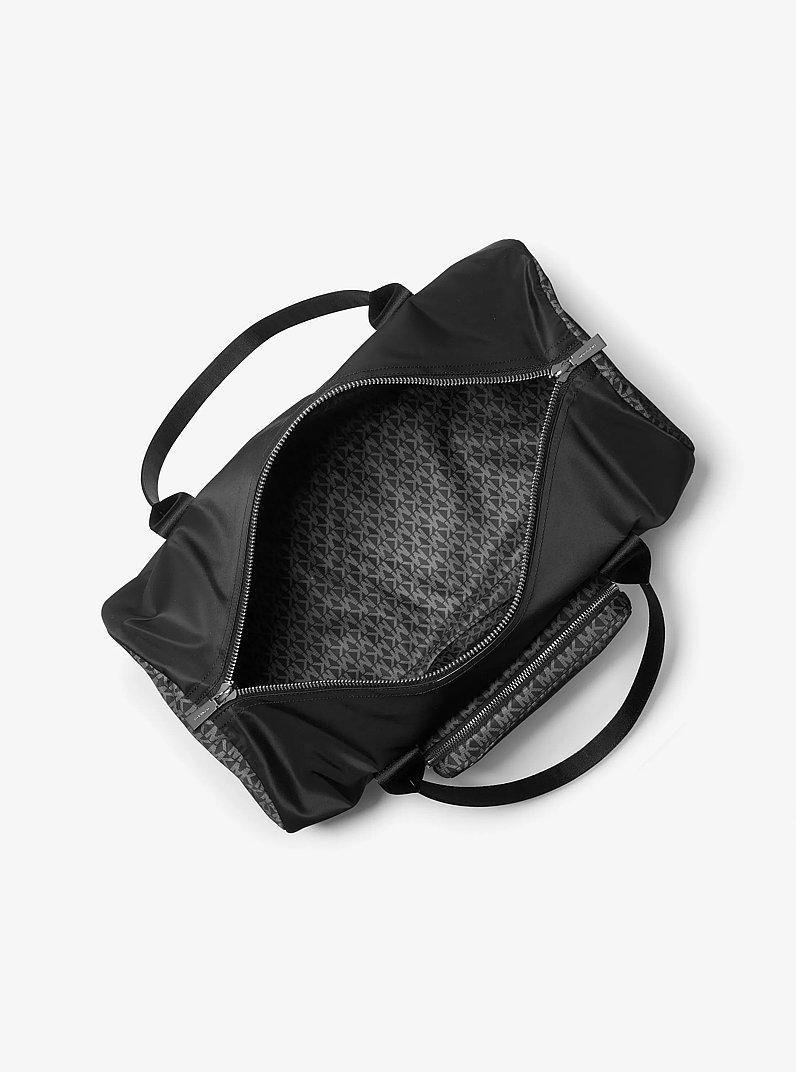 Borsa da weekend Tanner in nylon con stampa logo in NERO | Michael Kors