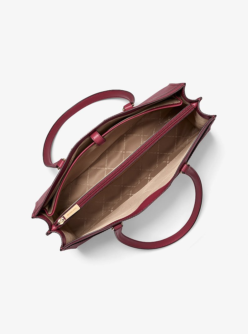 Grand cabas Jet Set Travel en cuir saffiano &agrave; poches