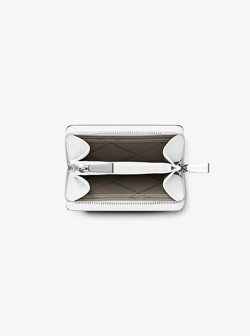 Porta carte di credito zip-around Jet Set piccolo in pelle martellata in BIANCO OTTICO | Michael Kors