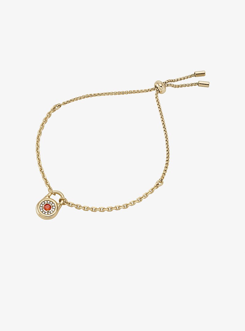 Pulsera deslizante de candado con incrustaciones in DORADO | Michael Kors