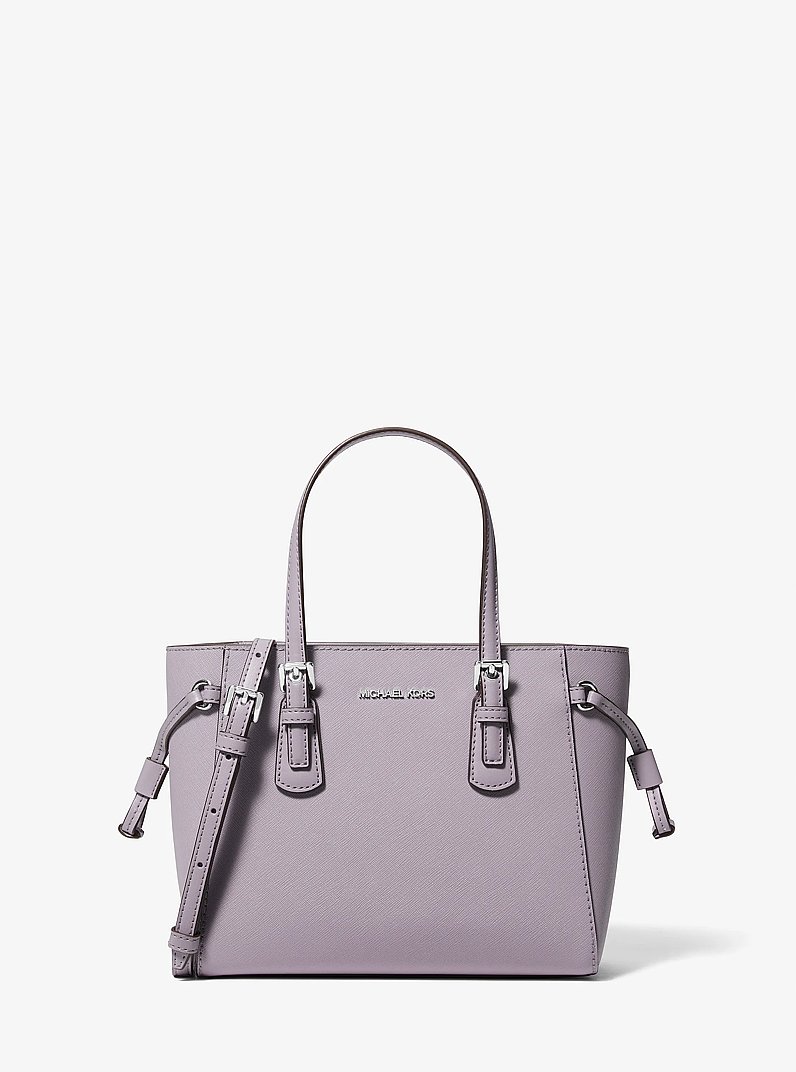 Bandolera Voyager convertible extrapeque&ntilde;a de piel granulada in LILA | Michael Kors