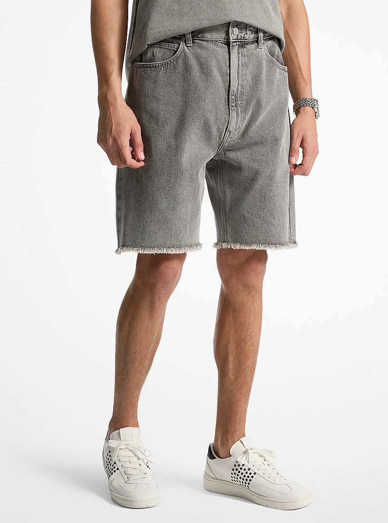 Short en denim effiloch&eacute; in LAVAGE DU B&Eacute;TON | Michael Kors