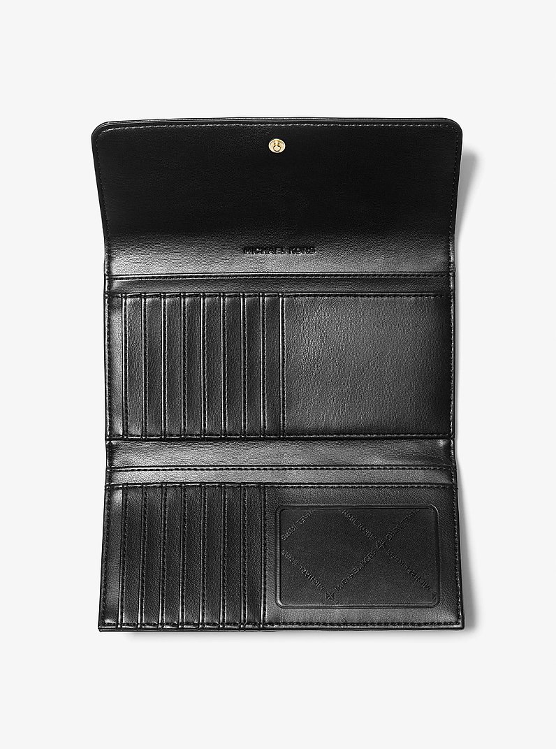 Jet Set Travel Large Quilted Tri-Fold Wallet in BLACK - Sale