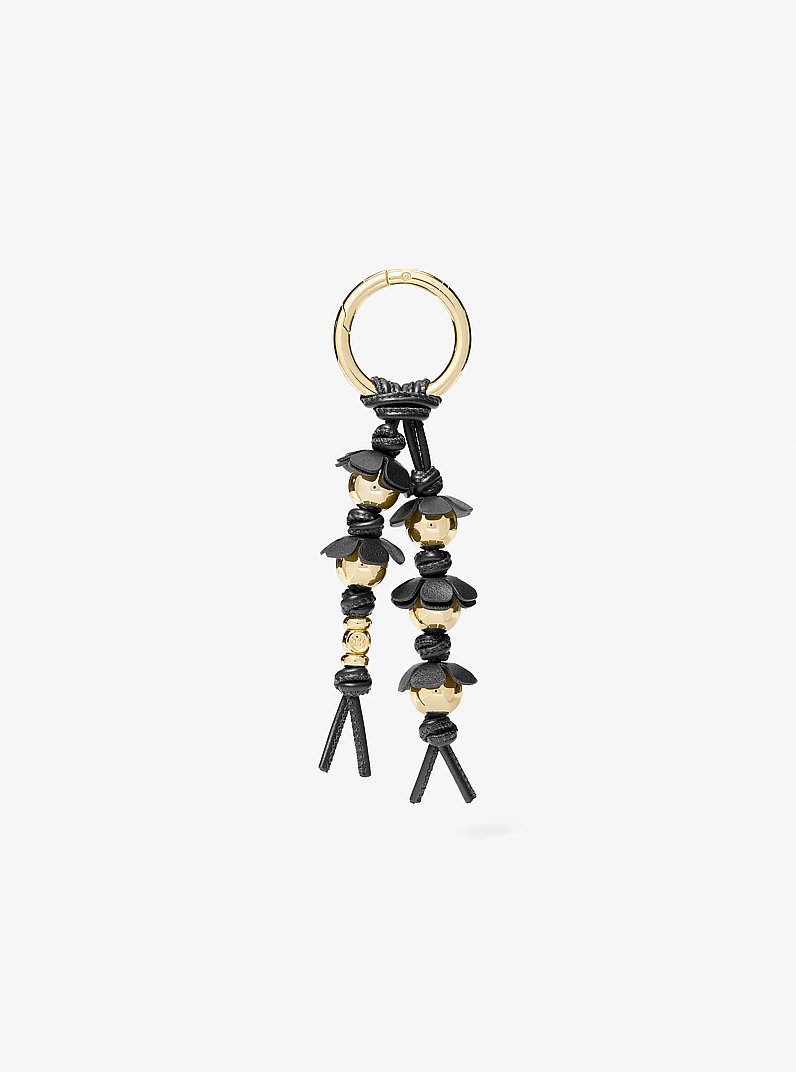 Breloque de sac florale travaill&eacute;e in NOIR | Michael Kors