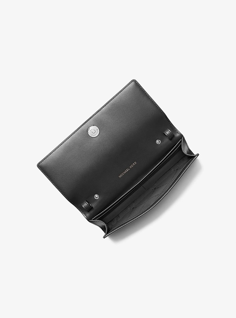 Bolso cruzado Carson grande transformable de cuero granulado in NEGRO | Michael Kors