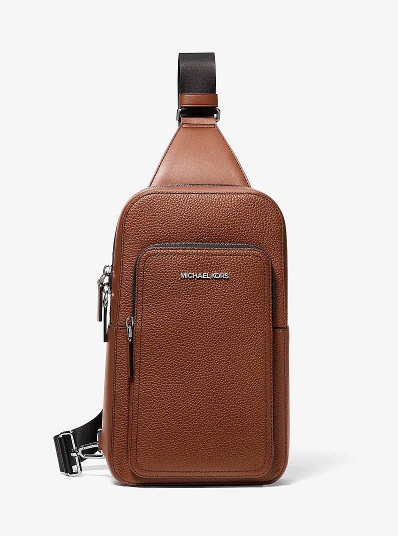 Cooper Slim Pebbled Leather Commuter Sling Pack in LUGGAGE | Michael Kors